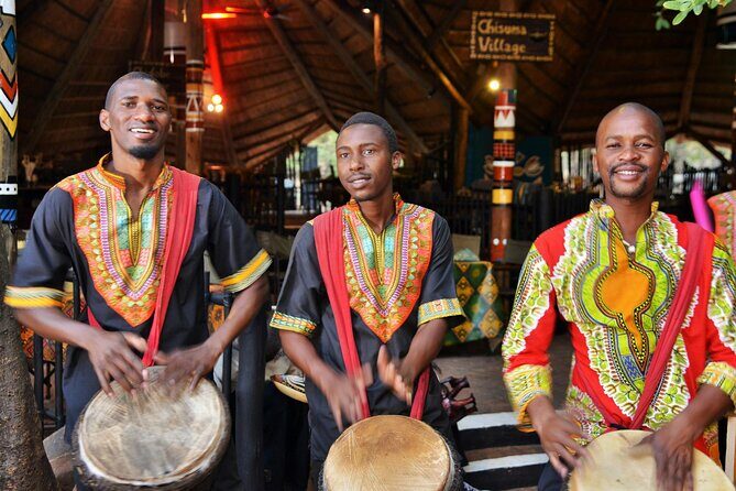 Boma Dinner, Dance and Drum Show in Victoria falls Town - The welcome moment: robe, face painting, and getting into the vibe