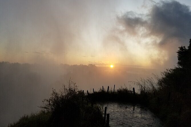 Guided Falls Tour & Zambezi River Cruise Combo - Two-day combo: how Zambezi sunset and Victoria Falls fit together