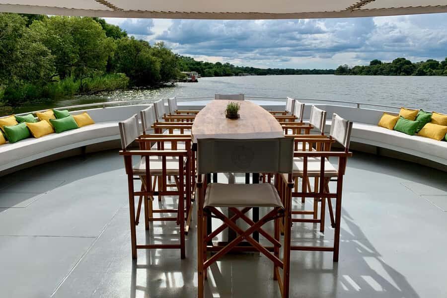 Luxury Sunset Dinner Cruise with 4-Course Meal - Wildlife from the deck: hippos, crocodiles, birds, and the riverbank cast