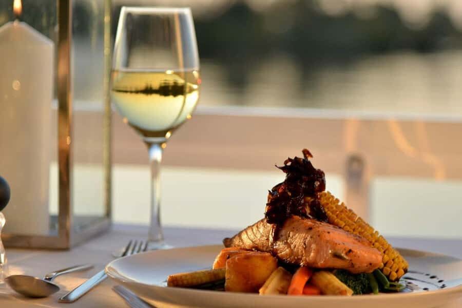 Luxury Sunset Dinner Cruise with 4-Course Meal - Before you board: hotel pickup and the short ride to the jetty