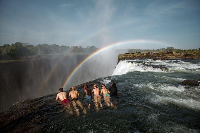 Small-Group Devil's Pool and Livingstone Island Tour - Livingstone Island: the boat ride, the guide style, and the photo moments