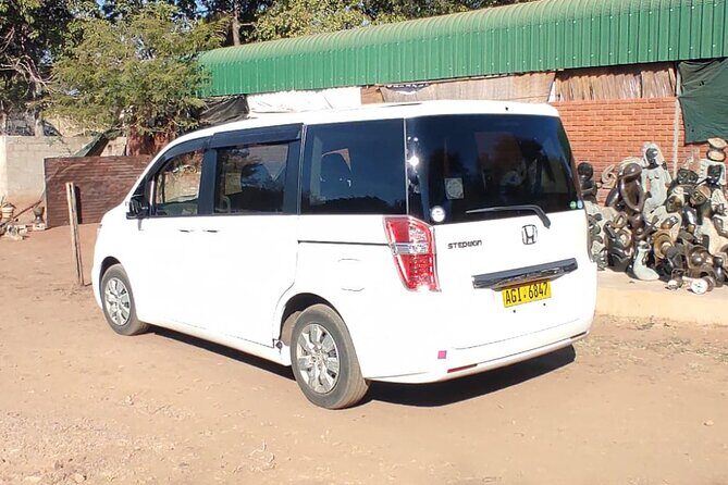 Victoria Falls Airport: Private Transfer to Hotels-Lodges-Airbnbs - Comfort and service level: licensed driver, air-conditioned van, small group flow