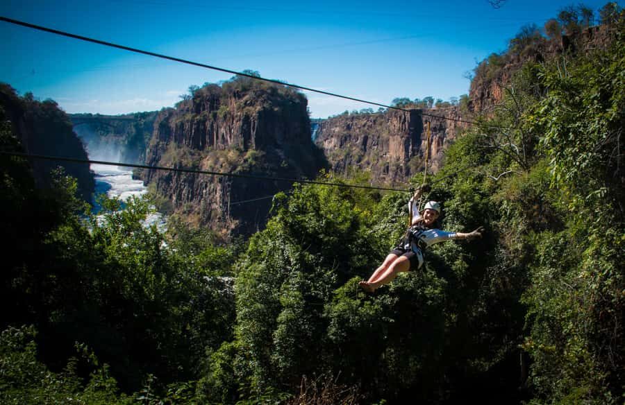 Victoria Falls: Canopy Tour with Transfers - Nine slides and a cable bridge walkway in the hardwood forest