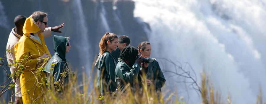 Victoria Falls Guided Tour Plus Lunch & Transport - Hotel pickup to Rainforest Entrance: the easy start