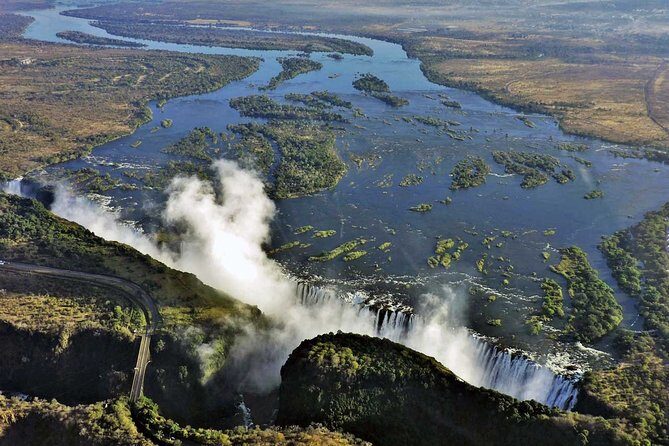 Victoria Falls Guided Tour with Hotel Pickup - The UNESCO site experience: rain-forest ecosystem views, not just pictures