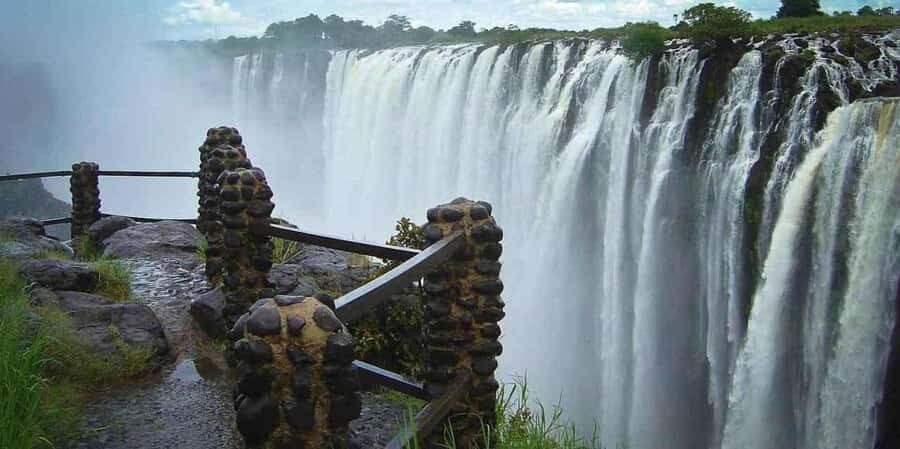 Victoria Falls Guided Tour Zimbabwe & Zambia From Both Sides - Zimbabwe Side: More Water, More Walking, Big Viewpoints