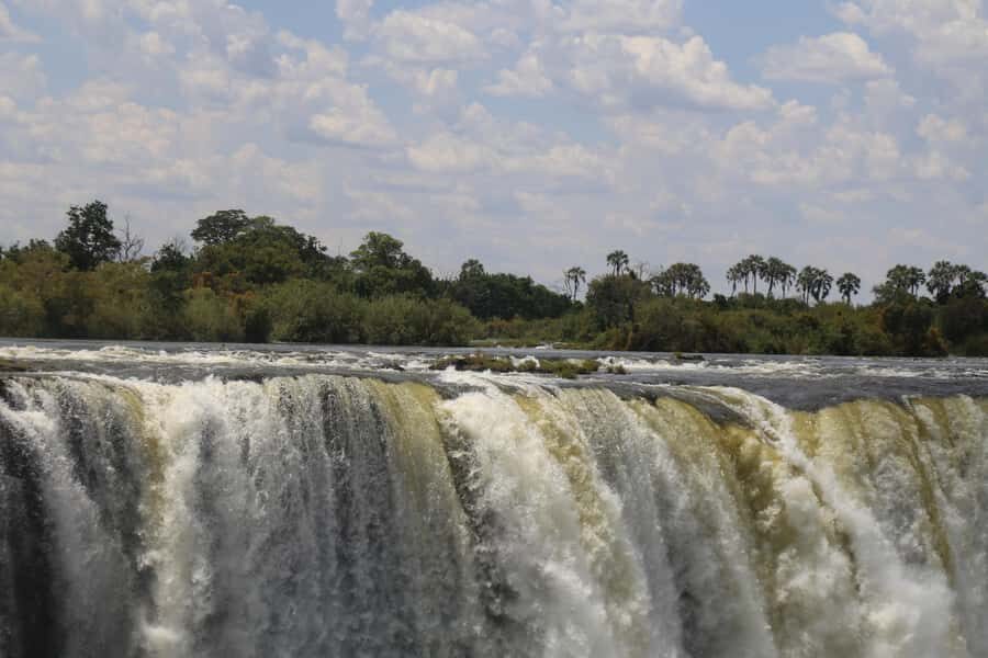 Victoria Falls: Private Guided Tour of the Waterfalls - Photos in the spray: raincoats that help, plus smart clothing
