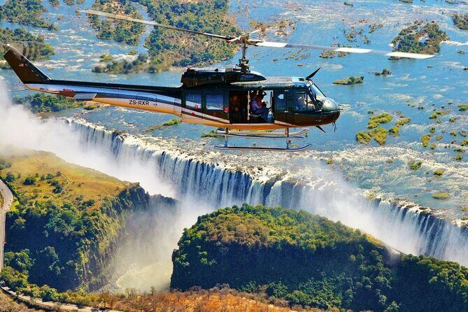 Victoria Falls : Scenic Day Tour, Lunch & Helicopter Flight - Pickup, timing, and how the day is paced
