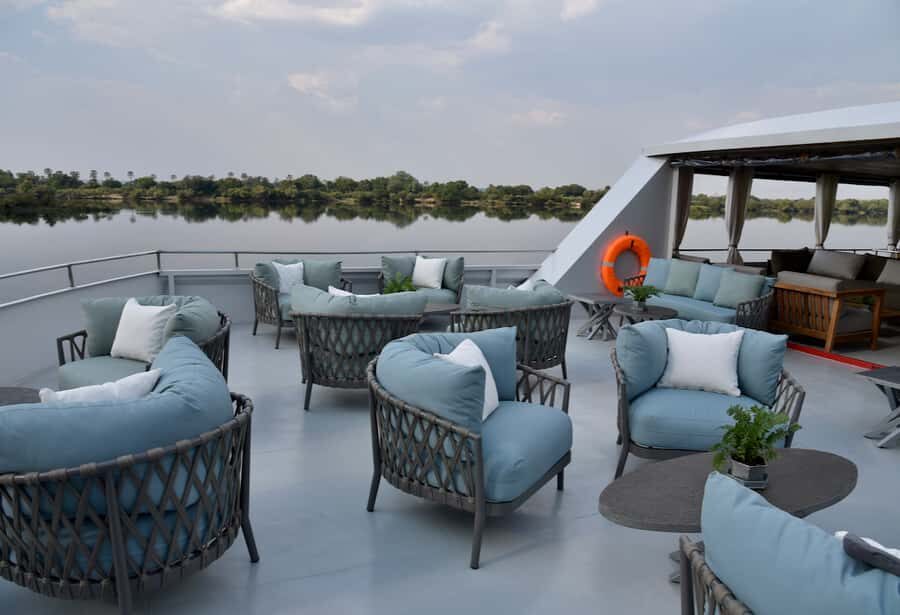 Victoria Falls Scenic Guided Tour with Sunset Boat Cruise - Timing shift: from misty walk to calm water