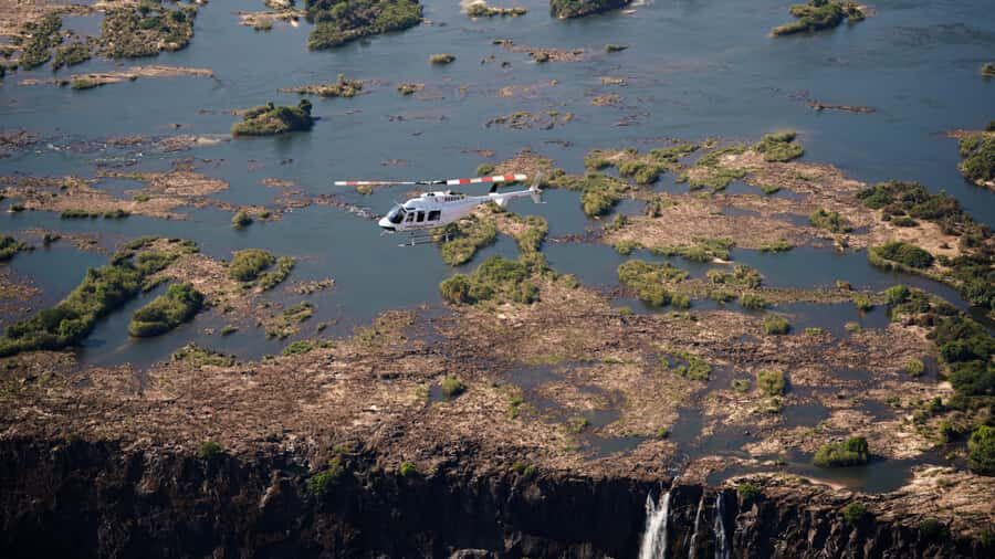 Victoria Falls:Explore the Zambezi Helicopter Experience - From pickup to helipad: where the day speeds up
